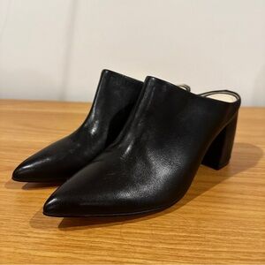 Marc Fisher black leather mules with pointed toe and block heel, size 7.5